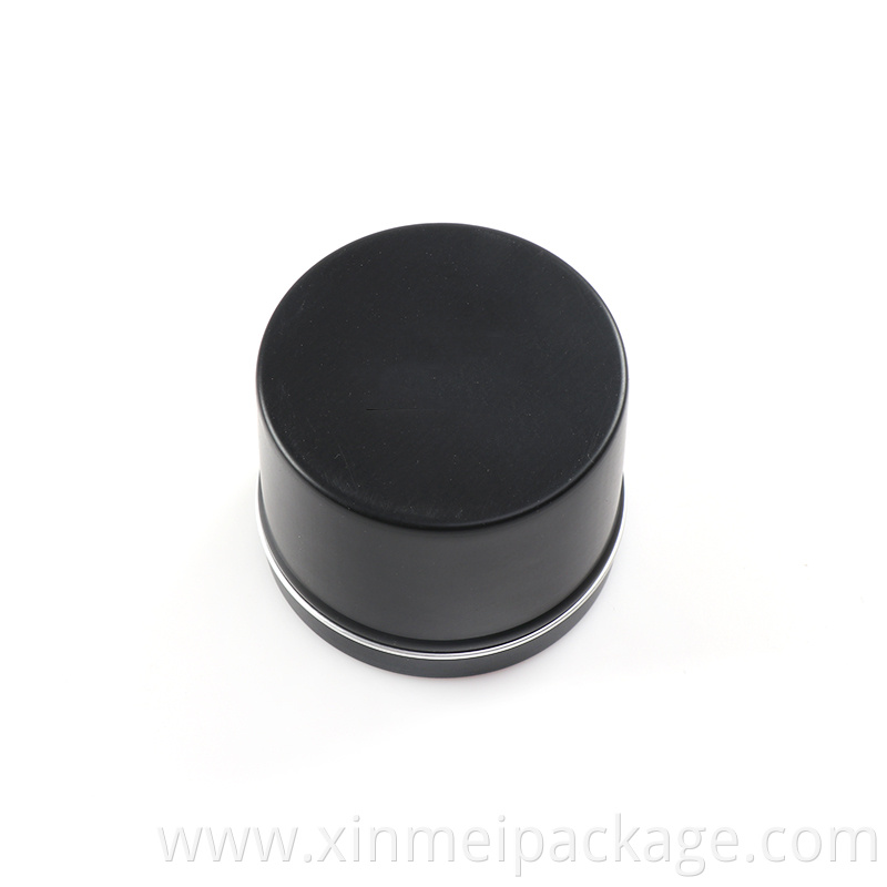 Black round tin